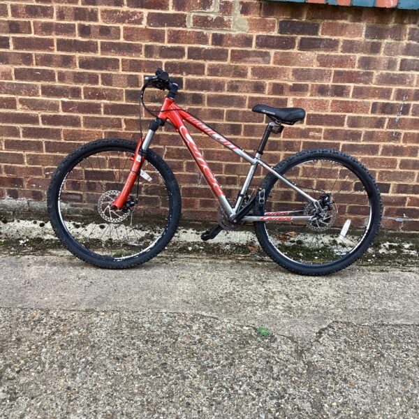 Grey and black Carrera Vulcan mountain bike for sale.