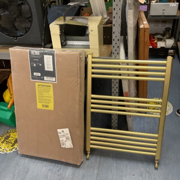 Reina Chisa towel radiator in original packaging, gold finish.