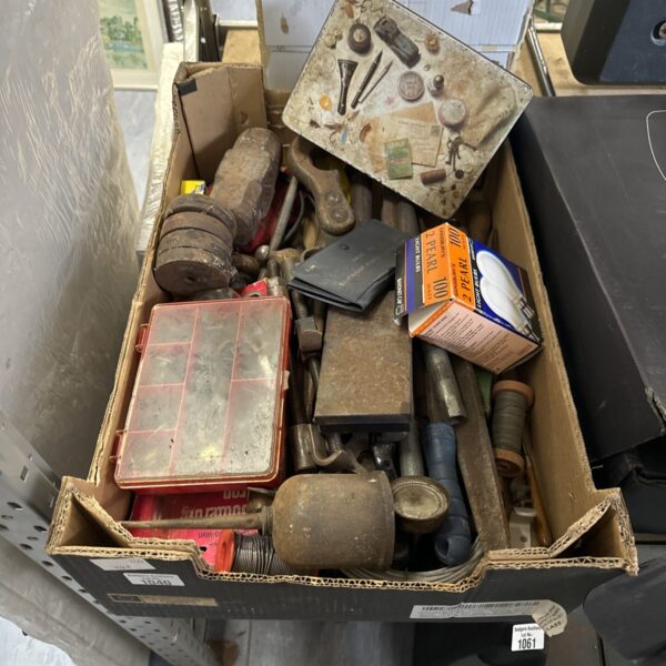Assorted vintage hand tools in a tool lot.