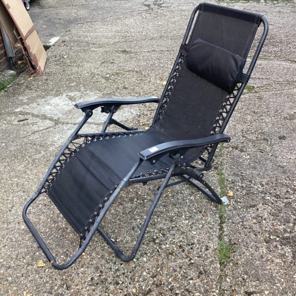 Metal frame folding garden chair with headrest for outdoor use.