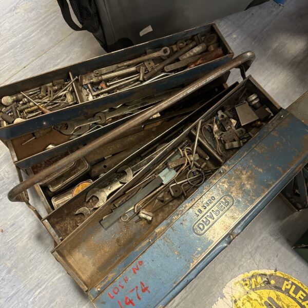 Vintage Draper toolbox filled with various tools for workshop repairs.