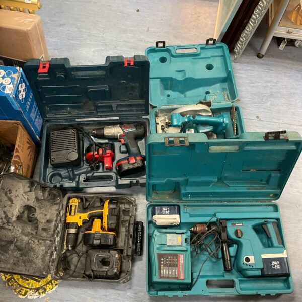 Assorted power tool cases including Makita and Dewalt.