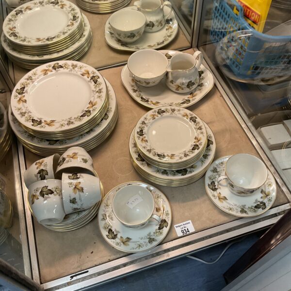 Royal Doulton Larchmont dinner service set displayed on a shelf.