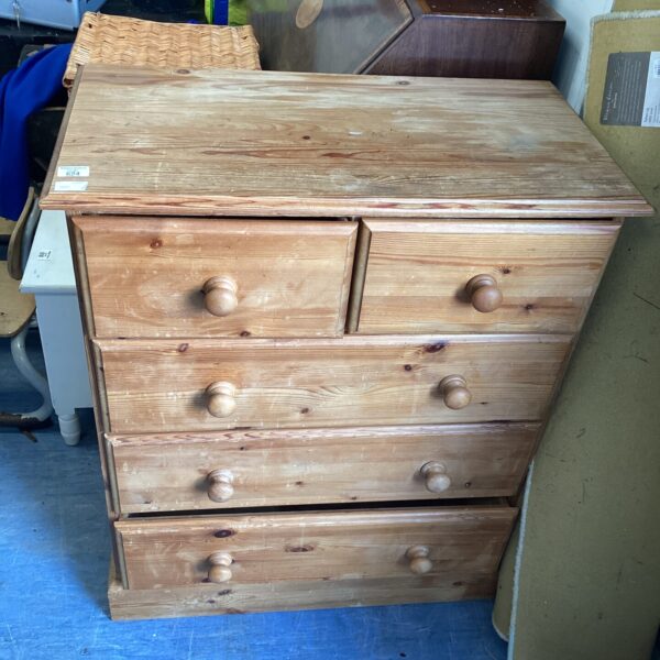 Vintage pine chest of drawers with two over three drawer configuration.