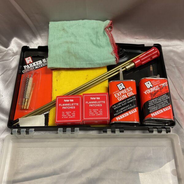 Vintage Parker Hale gun cleaning kit with oil and patches.