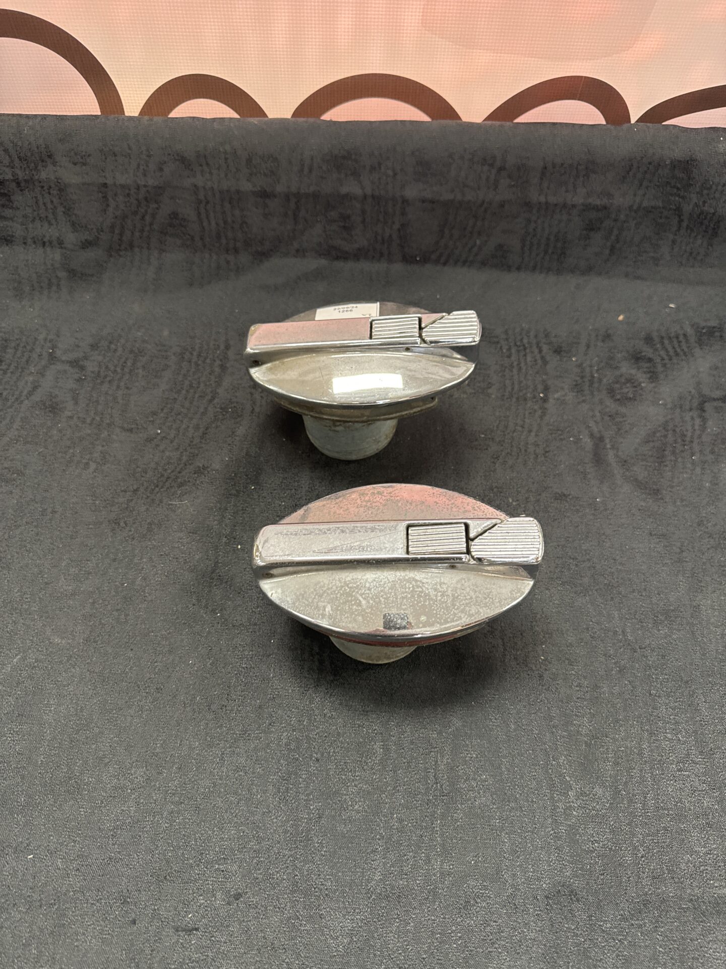 944 Two classic car fuel filler caps