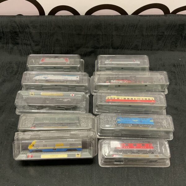 Del Prado model train lot of ten in clear cases.