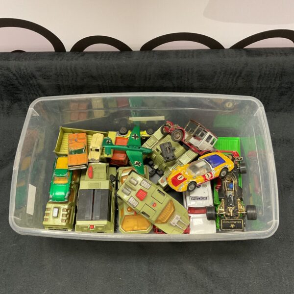 Vintage diecast vehicle lot with Matchbox cars and trucks.
