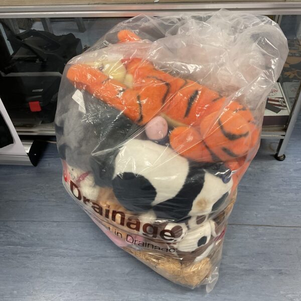 Large sack of Disney and other soft toys, a colourful toy bundle.