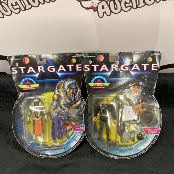 Two retro stargate action figures on cards