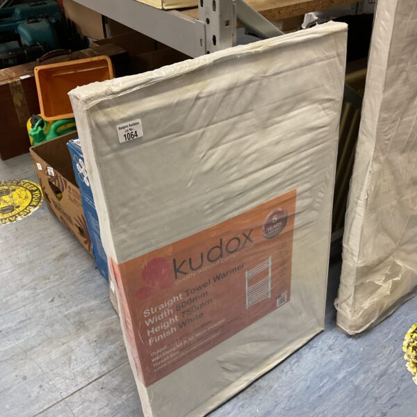 New Kudox 500mm x 750mm towel warmer in packaging.
