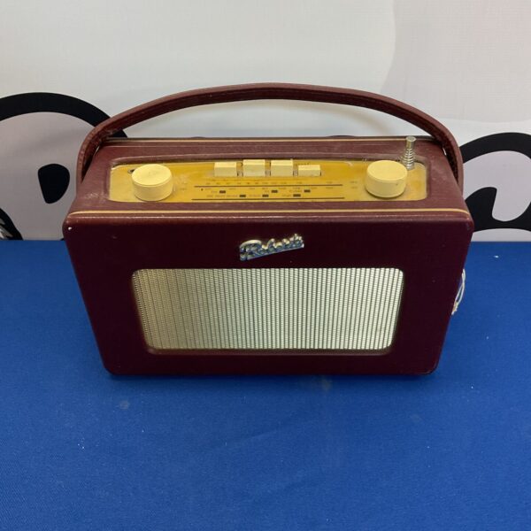 Vintage burgundy Roberts radio, classic retro design.