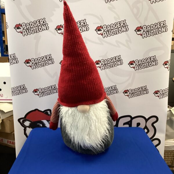 Large red-hatted gnome doorstop for home or garden.