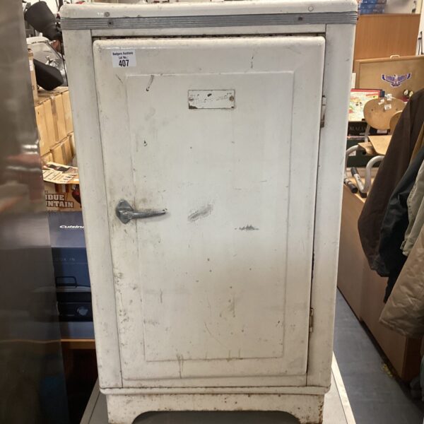 Vintage houseproud cupboard from the 1940s, ideal for retro kitchen storage.