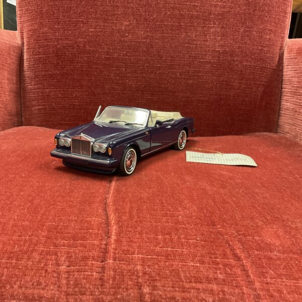 Purple 1993 Rolls Royce Corniche IV convertible classic car.