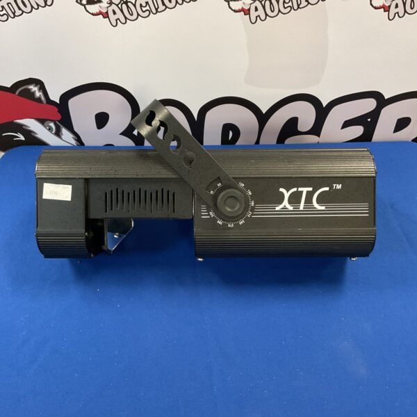 Vintage XTC beam effect light for stage and event lighting.