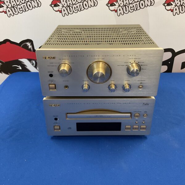 Vintage Teac a-h500 amplifier with 7-disc CD player, classic audio equipment.