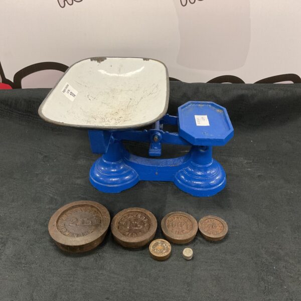 Vintage Fairbanks domestic scales with Avery weights for accurate measurement.