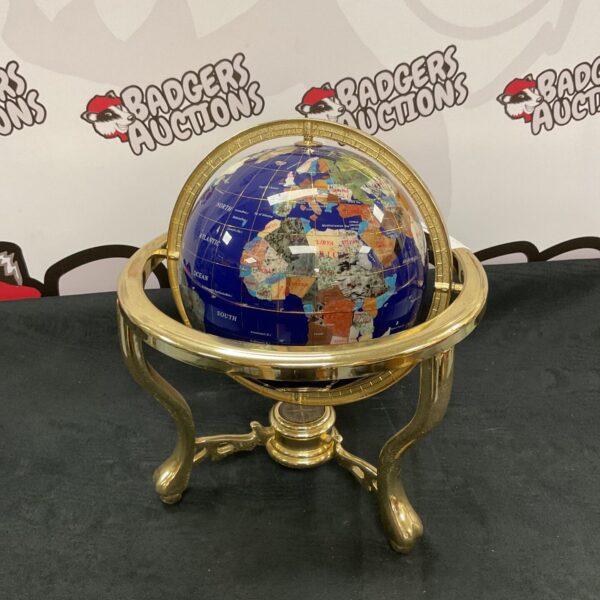 Antique semi-precious gemstone globe on brass stand.