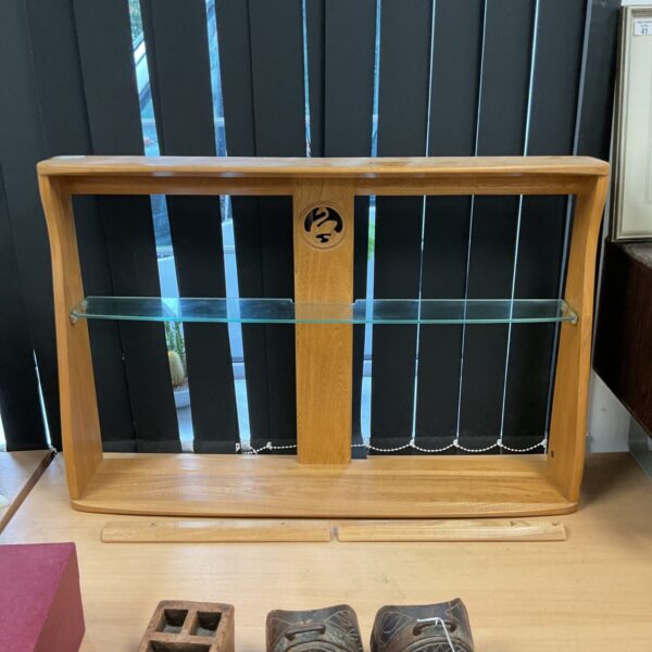Vintage Ercol Swan shelf in golden dawn finish, mid century modern style.