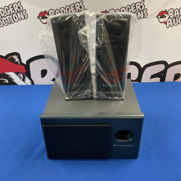 Altec Lansing speakers and subwoofer system presented in photograph.