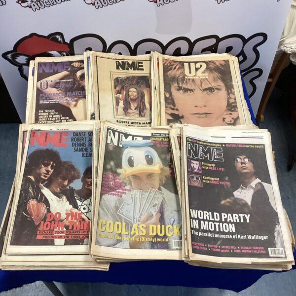 Vintage NME newspapers, a collection of British music press.