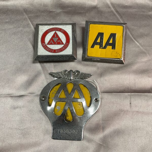 Vintage AA and Institute of Advanced Motoring car badges for collectors.