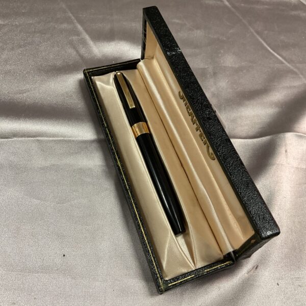 Vintage Sheaffer fountain pen displayed in its original presentation box.
