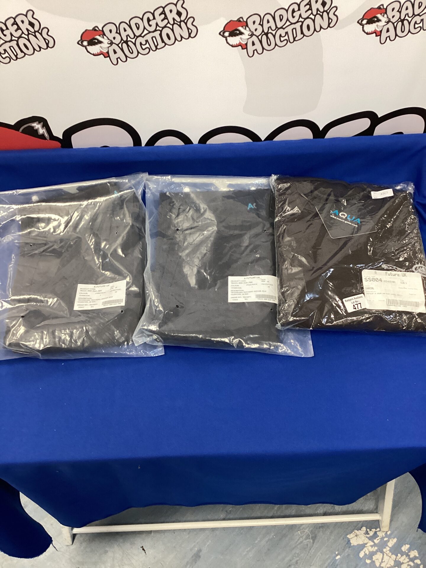 477 New jaguar & land rover jumper with two pairs of size 28 work trousers