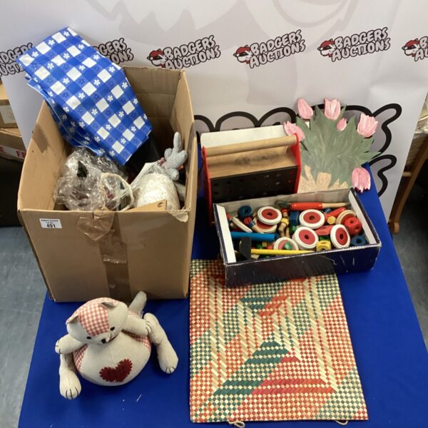 House clearance lot featuring a teddy bear and building blocks.