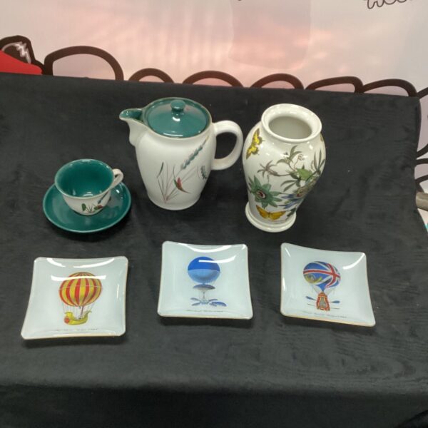 Vintage Denby coffee set with floral pattern on a white surface.