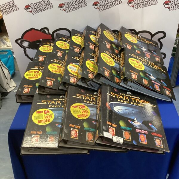 Stack of vintage Star Trek Fact Files magazines, collectible science fiction.