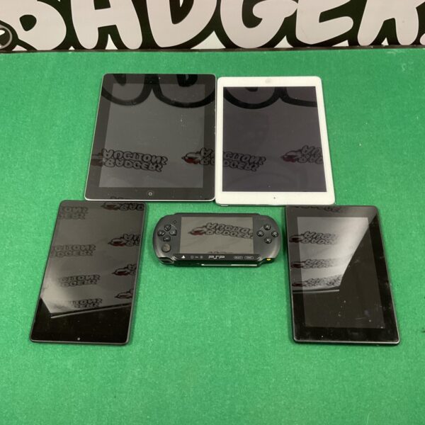 Lot of vintage PSP and iPad tablets for gaming and entertainment.