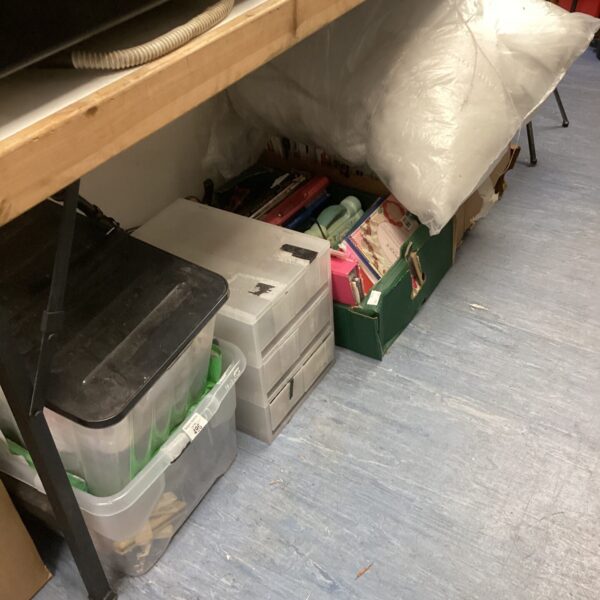 Mixed lot of craft supplies in cardboard boxes.