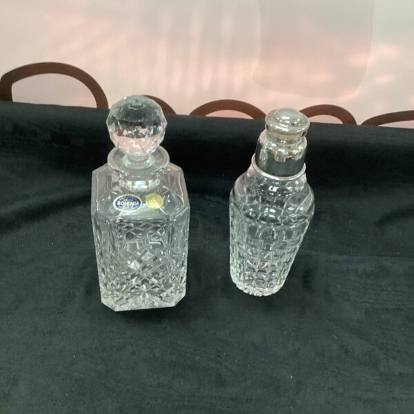 Vintage crystal cocktail shaker with faceted art deco design.