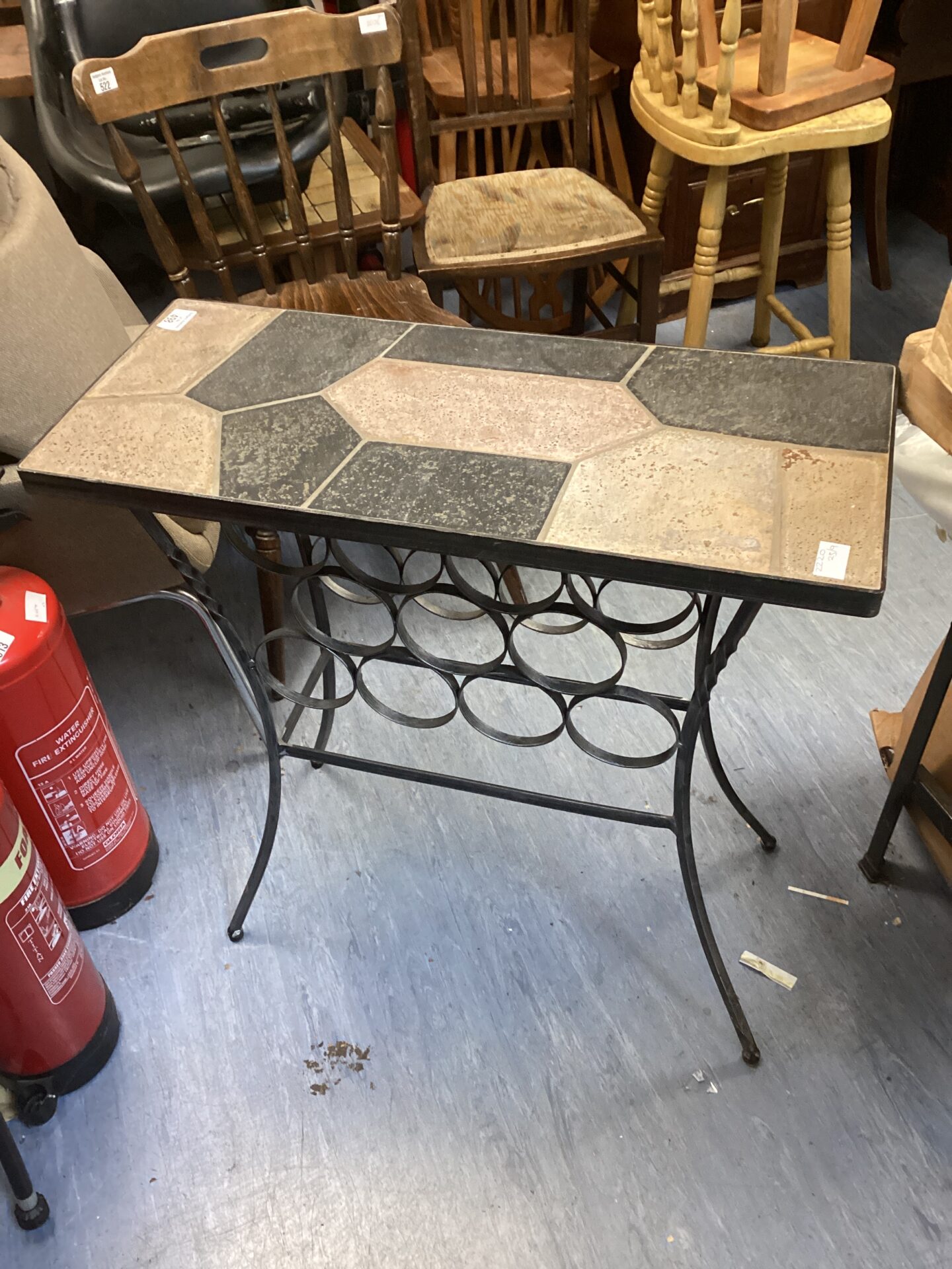 498 Stone topped metal framed wine rack table 28/12/30”