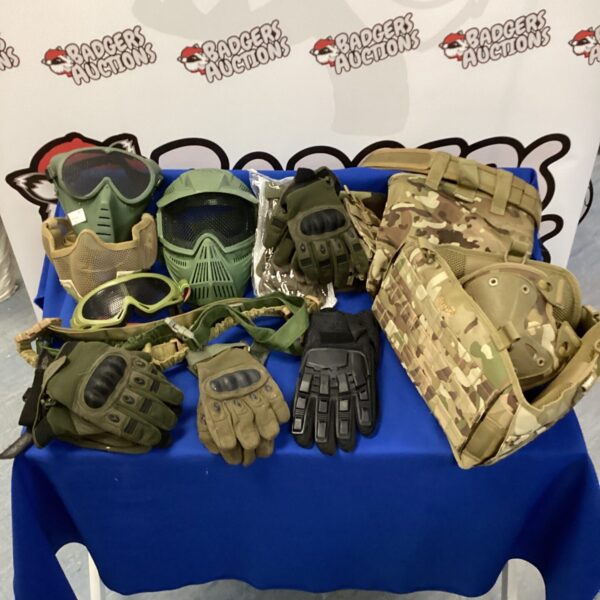 Airsoft accessories lot including mask, gloves, and pouches.
