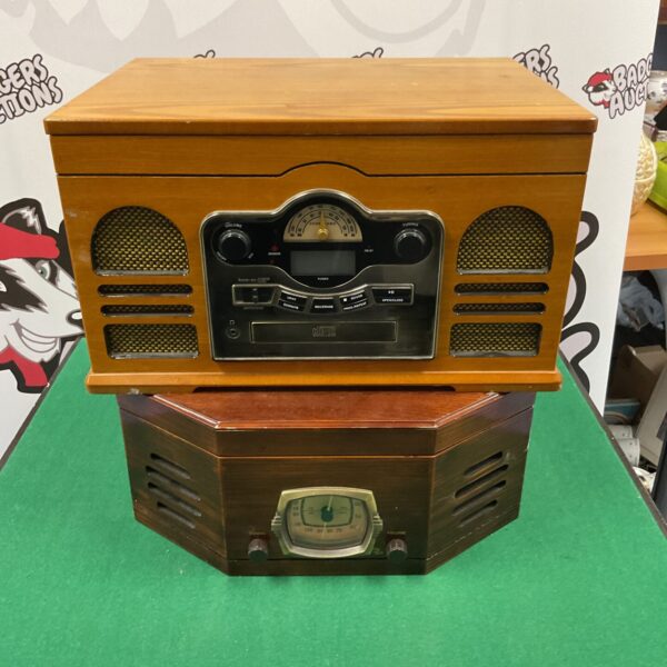 Front view of a vintage hifi unit with record, CD, and radio player.