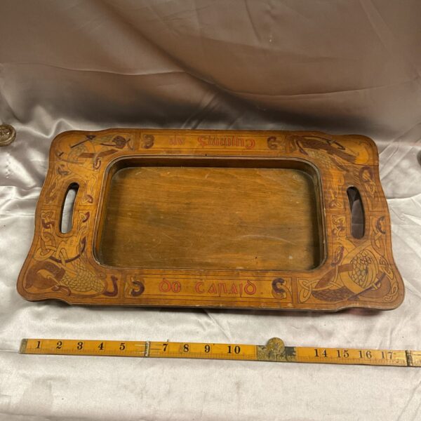 Vintage Irish Celtic wood tray with intricate knotwork design.