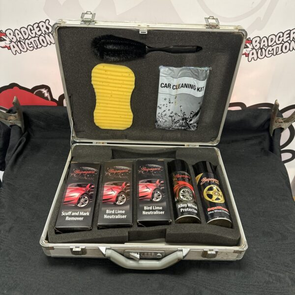 Supagard car cleaning kit in a metal case, showing cleaning products.