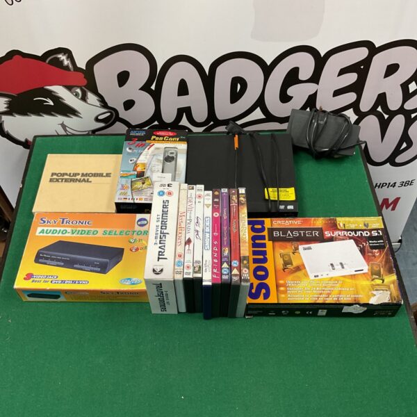 Overview of mixed electronics and DVD lot including sound card and DVD player.