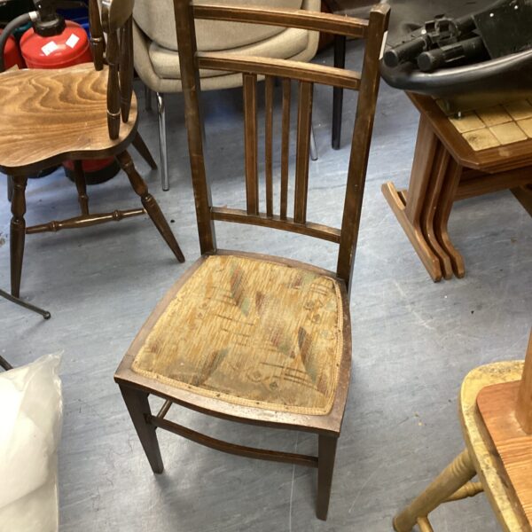 Vintage inlaid dining chair with detailed wood work.
