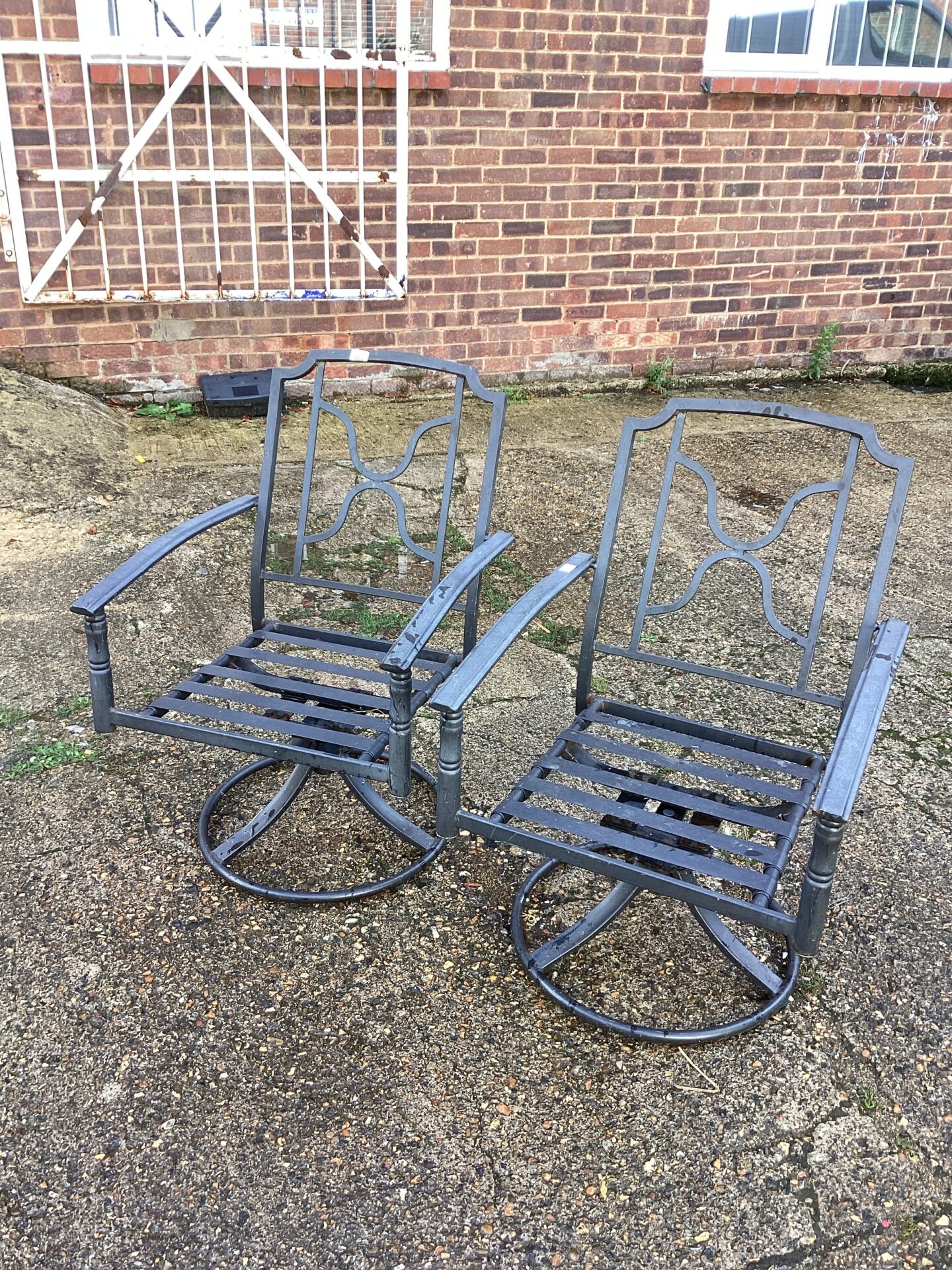 1051 Two metal garden chairs