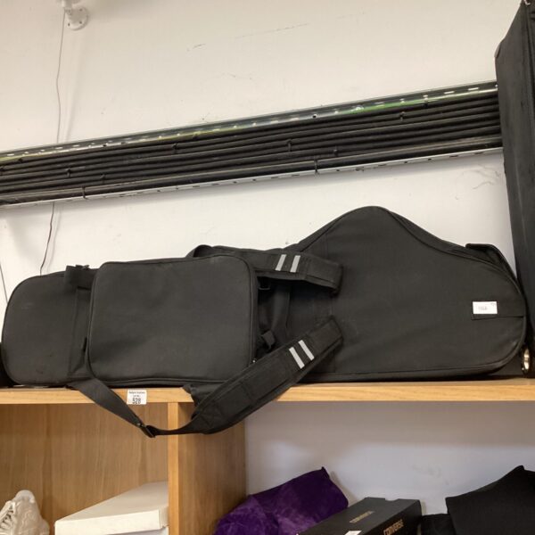 Black instrument case gig bag for music gear protection.