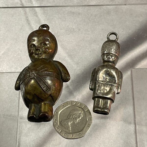 Antique whitemetal baby rattle shaped as a soldier.
