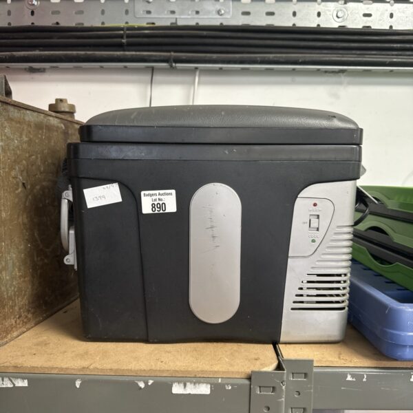 Front view of a grey 12v insulated box with a power switch.
