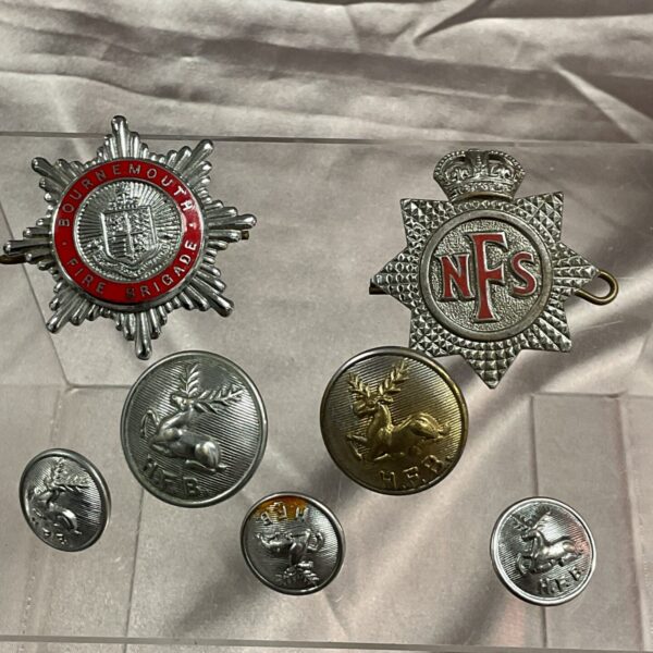 Vintage Bournemouth and NFS fire brigade cap badges and buttons collection.