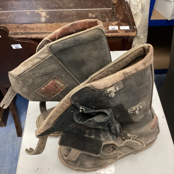 Vintage Sammy Miller boots, classic leather motorcycle footwear.
