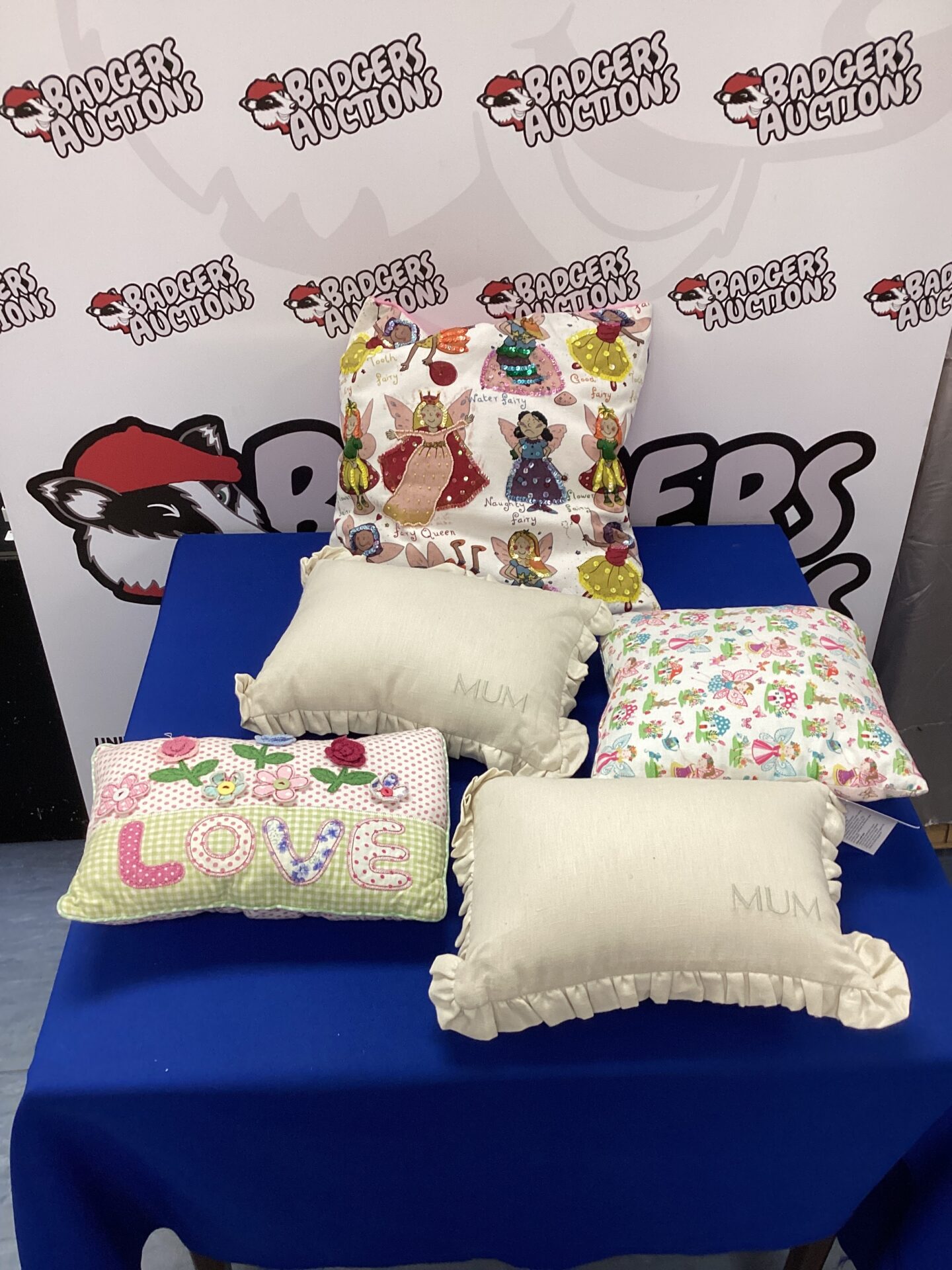 390 Selection of cushions including fairy cushion