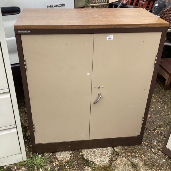 Vintage Escoline metal storage unit with two doors.